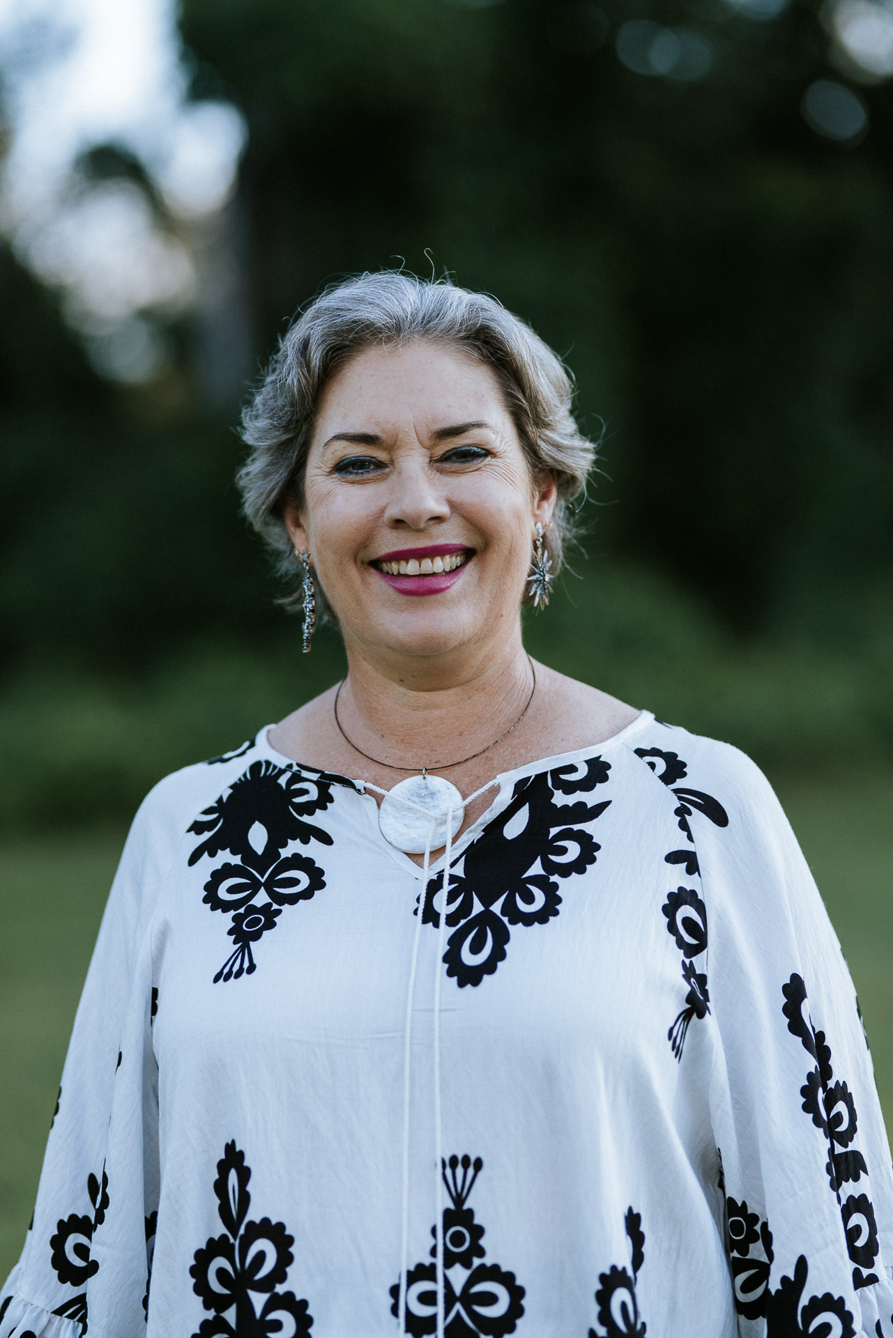 Close-up portrait of Melissa Meagher smiling outdoors