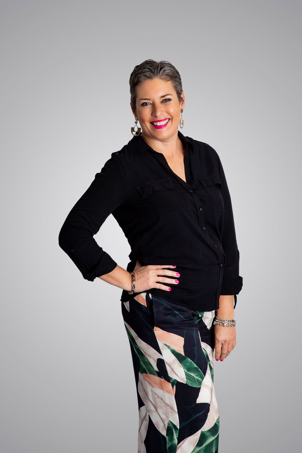 Melissa Meagher standing confidently, ready to speak