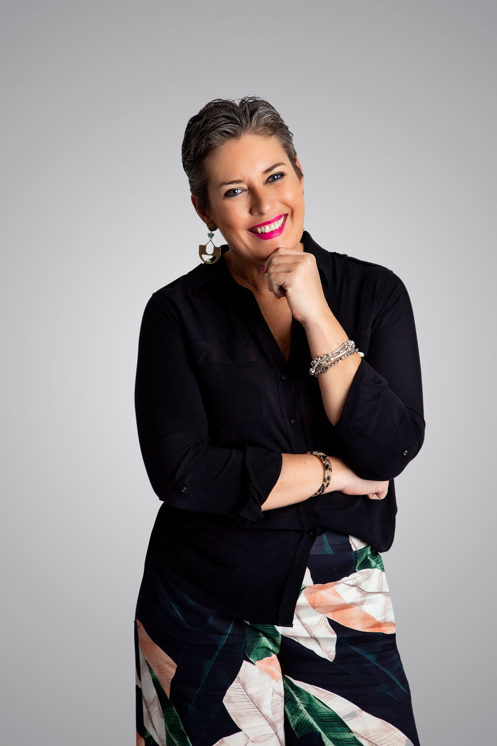 Portrait of Melissa Meagher, warm chin-on-hand smile